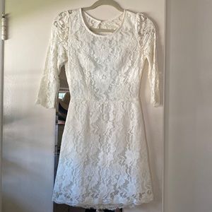 White / ivory lace dress. Cut out back. Size xs/s